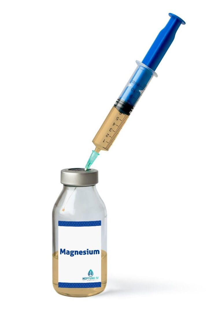 A syringe extracting liquid from a vial labeled "magnesium" for mobile IV therapy.